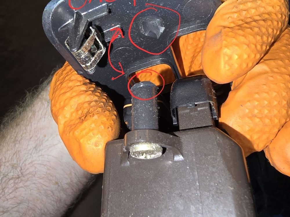 Mobile auto repair detail work on a vehicle door master lock switch