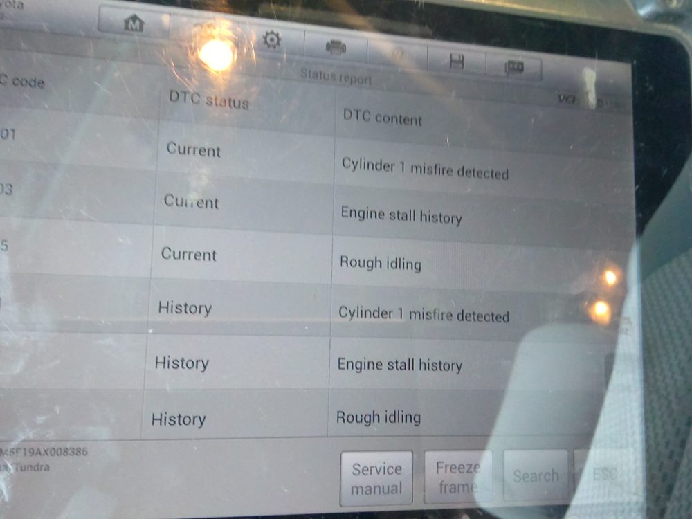 Automotive scan tool showing active diagnostic trouble codes during mobile diagnostics